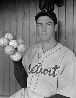 Lynwood Rowe Holding Seven Baseballs in One Hand