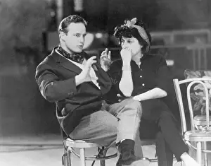 Prints of (Original Caption). Photo shows Marlon Brando and Anna Magnani seated and talking. Ca. 1950s The Iconic Moments Captured: M Brando & Anna Magnani Seated/Talking
