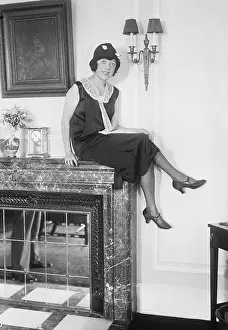 Mabel Normand Sitting on Mantel