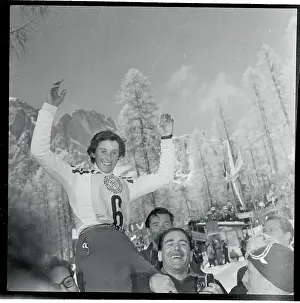 Madeleine Berthod Riding Shoulders of Fans with Her Arms Raised