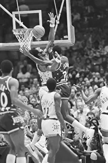 Magic Johnson Prints: Magic Johnson and Artis Gilmore under Basket