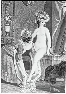 Maid Helping Lady Dress In Dressing Room