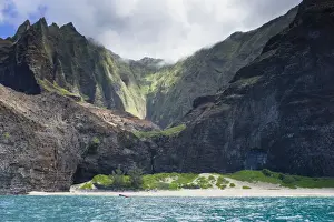 Majestic views of extreme terrain at Honopu Beach along the Na Pali Coast, Kauai, Hawaii, USA