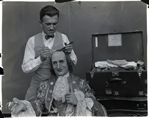 Cosmetics Prints: Makeup Man Putting Makeup On Seated Acto