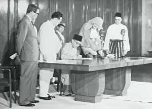 Malayan Leader Signing Oath