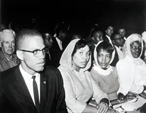Malcolm X Sitting in Court Room