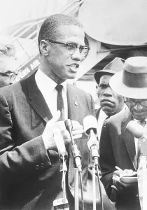 Muslim Prints: Malcolm X Speaking to the Press