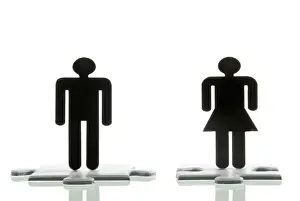 Couples Prints: Male figure and a female figure standing on jigsaw puzzle pieces