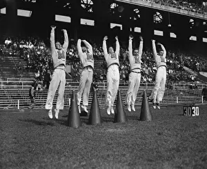 Cheering Prints: Five Male Maryland Cheerleaders Jumping