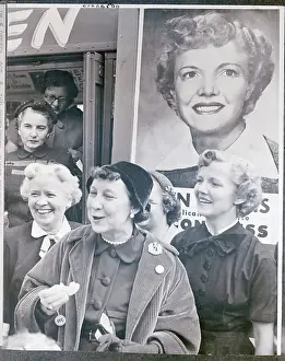 Mamie Eisenhower Eating a Doughnut