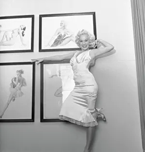 Mamie Van Doren Posing with One Foot Against The Wall