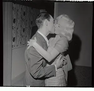Mamie Van Doren and Ray Anthony Embracing at Their Wedding