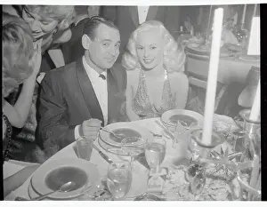 Mamie Van Doren and Ray Anthony at Sitting Dinner Table