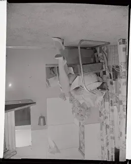 Mamie Van Doren Sitting and Sipping from a Straw