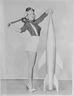 Mamie Van Doren Standing by Mock Rocket