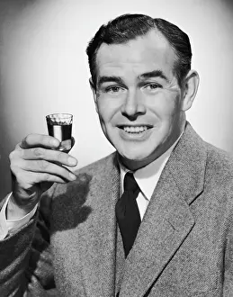Man with alcoholic beverage