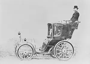 Man Atop Early French Cab