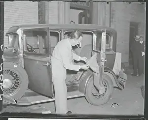 Man with Automobile