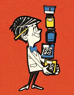 Images Dated 26th February 2015: Man Balancing Products