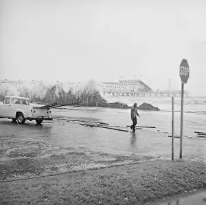 Hurricane Prints: Man On Beach Near Large Breaking Waves