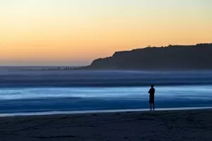 Images Dated 11th January 2013: Man on the beach with surf, Opunake, Taranaki Region, New Zealand
