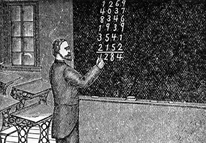 Man at Blackboard Adding Long Columns of Numbers