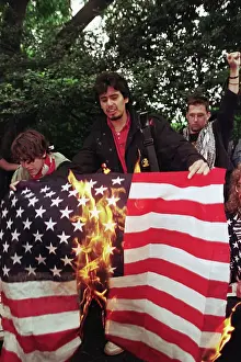 Man Burning American Flag