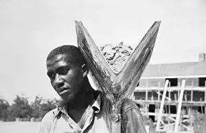 Man Carrying Concrete for Construction