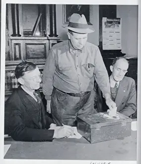 Man Casting Ballot