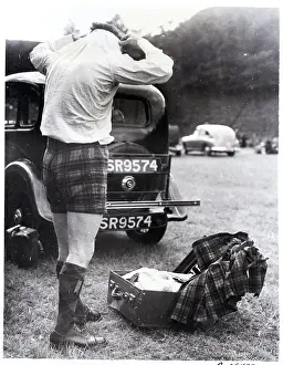 Kilt Prints: Man Changing Out Of Kilt