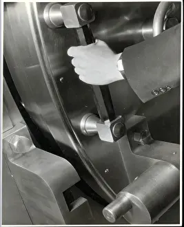 Watch Prints: A Man Closes A Large Bank Vault
