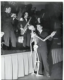 Man Dancing with Skeleton