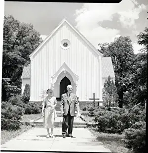 Employee Prints: Man and Daughter Stand Outside Church