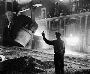 Furnace Prints: Man Directs Pouring Of Steel Into Furnac