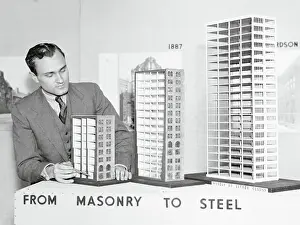 Similarity Prints: Man Displaying Building Models