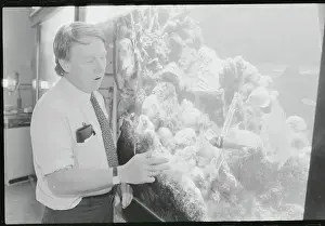 Coral Prints: Man Displaying Coral Reef