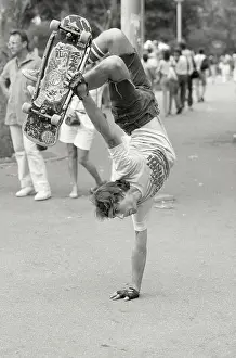 Handstand Prints: Man Doing Handstand On Skateboard