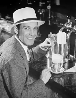 Man drinking ice cream soda (B&W), portrait