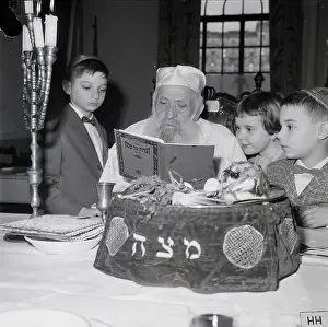 Man Explains Passover Symbolism to Children