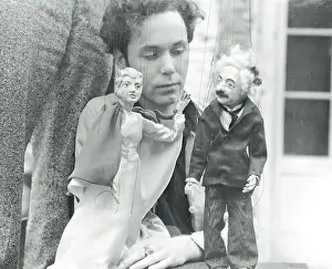 Evangelist Prints: Man with Famous Personality Hand Puppets