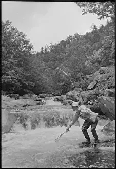 Man Fishing in Little River