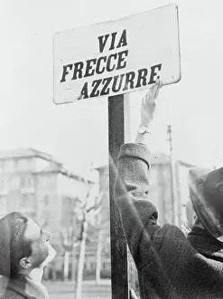 Nonconformity Prints: Man Gesturing Towards Street Sign
