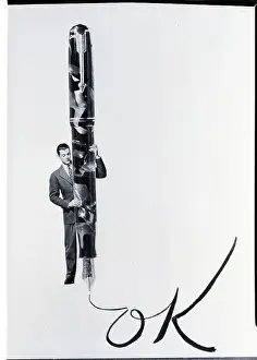 Huge Prints: Man With Giant Pen Writing Ok