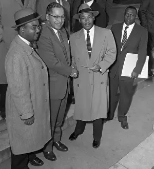 Man Giving Martin Luther King A Check
