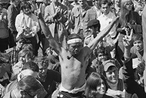 Hippie Prints: Man Giving Peace Sign at Rally