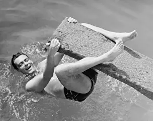 30 35 Years Prints: Man hanging on diving board (B&W), elevated view