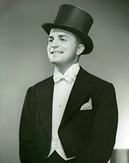 Retrofile Gallery: Man in top hat, white tie and tails