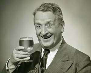Man having a mixed drink