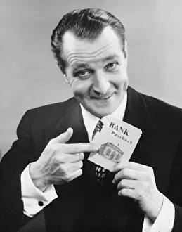 Man holding bank book