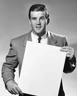 Necktie Prints: Man holding blank paper